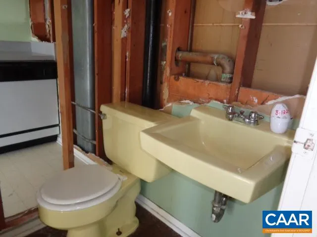 a bathroom with a sink and toilet