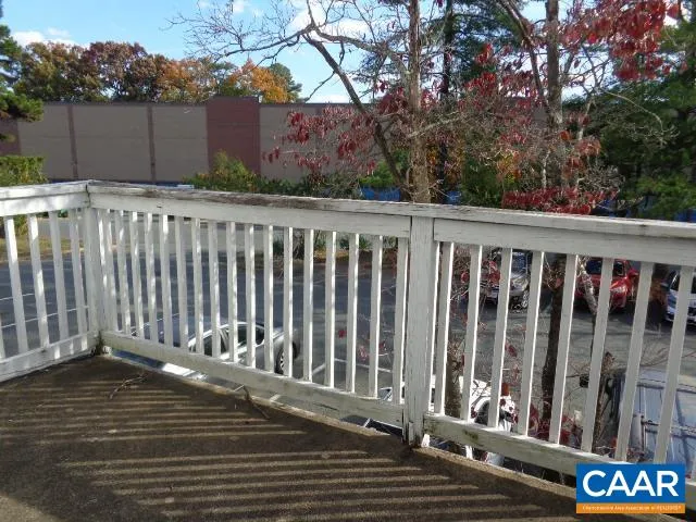 a view of a wooden fence
