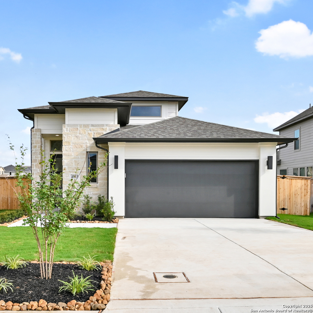 4971 Park Manor Schertz, TX 78124 - Photo 1 of 1 a front view of a house with a yard