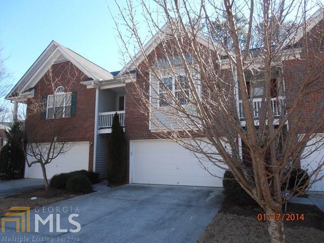 1918 Manhattan Parkway Decatur, GA 30035 - Photo 1 of 1 a view of a house with a yard