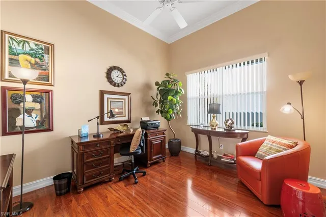 a view of a livingroom with furniture and a window