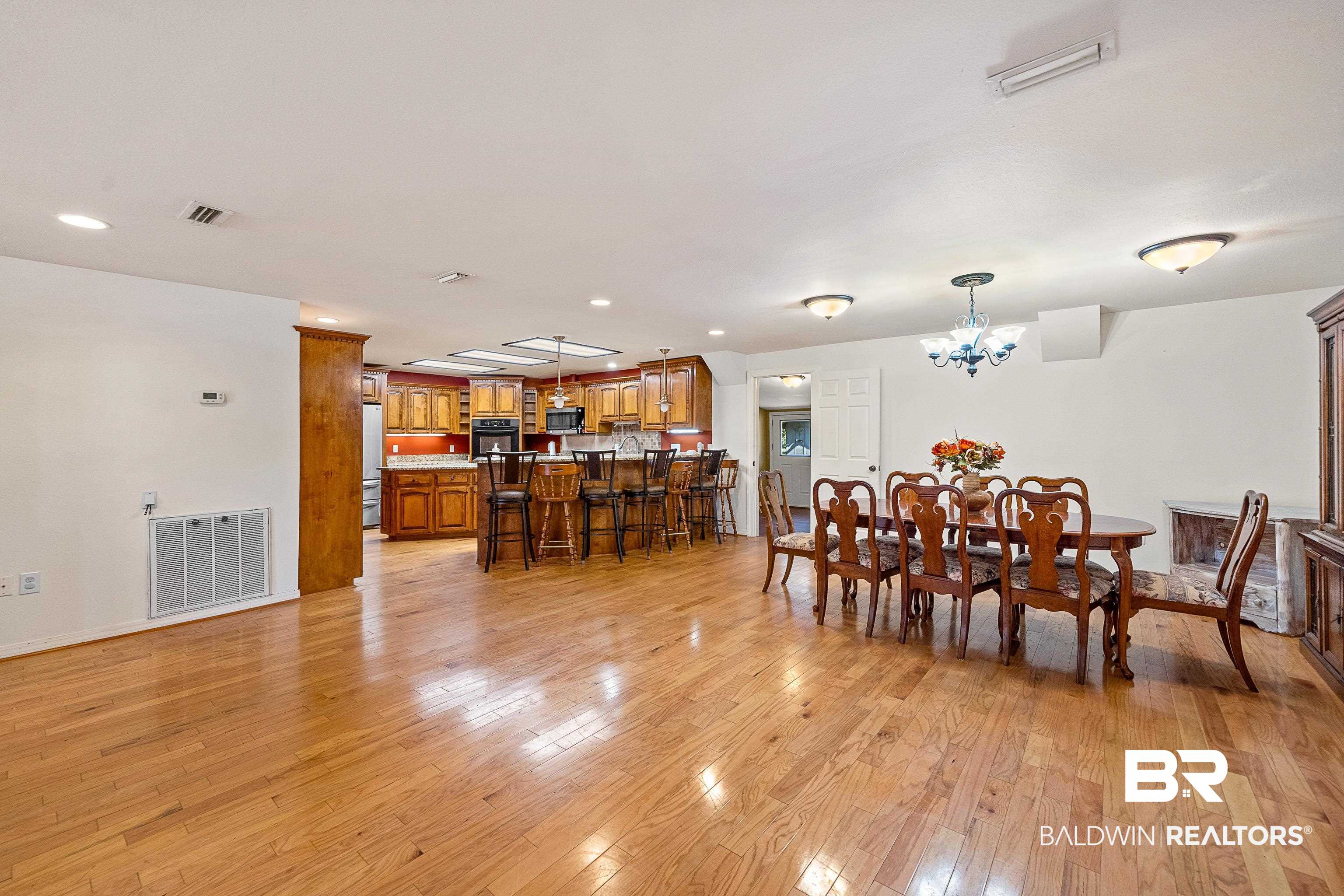 11528 Whitehouse Fork Road Bay Minette, AL 36507 - Photo 10 of 37 Dining space featuring light wood-style floors, a chandelier, and recessed lighting