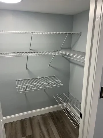 a bathroom with a toilet and shower