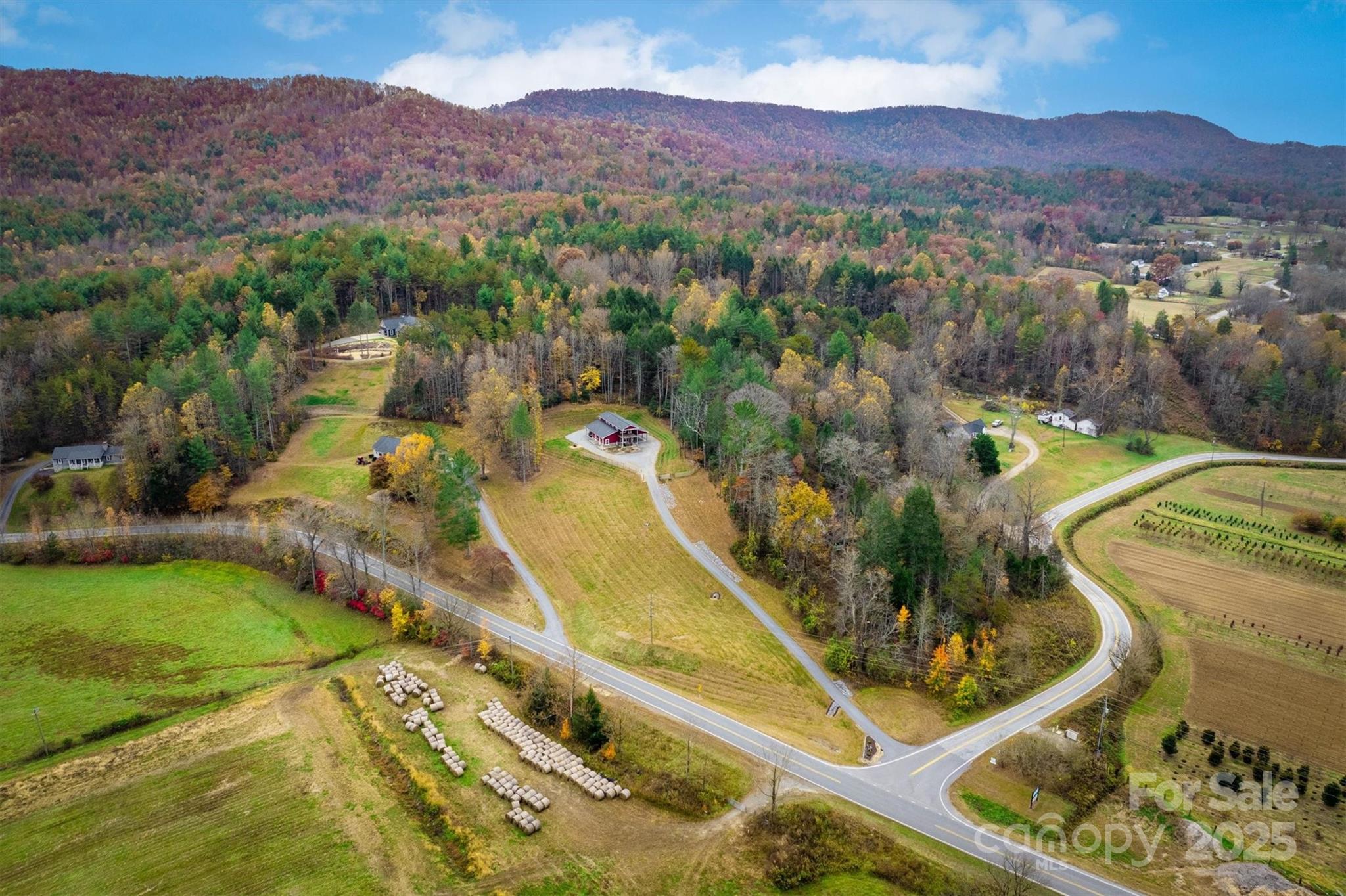 4447 Steeltown Road Lenoir, NC 28645 - Photo 11 of 42 a view of a swimming pool with a mountain