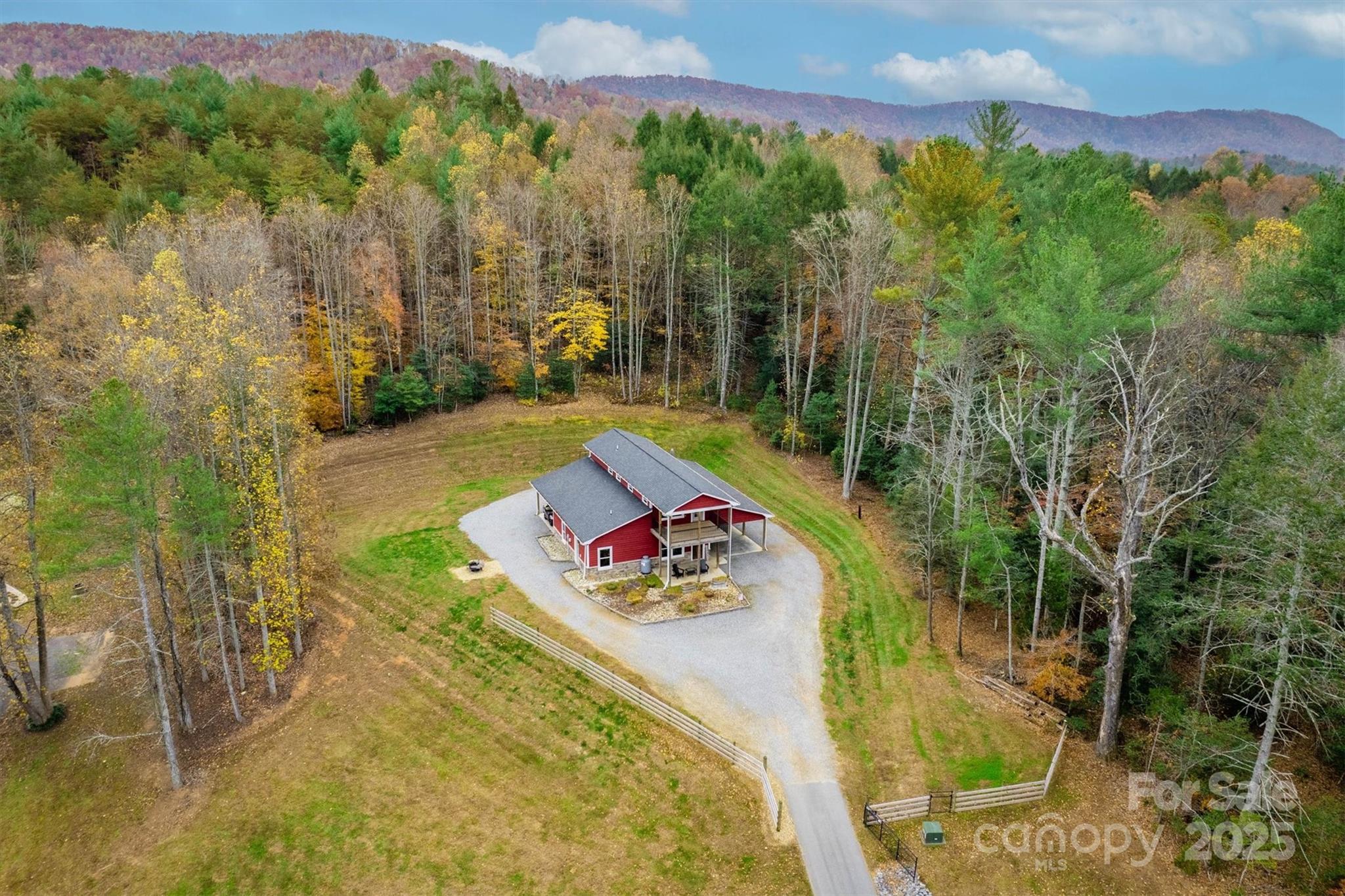 4447 Steeltown Road Lenoir, NC 28645 - Photo 16 of 42 a view of a swimming pool with a yard