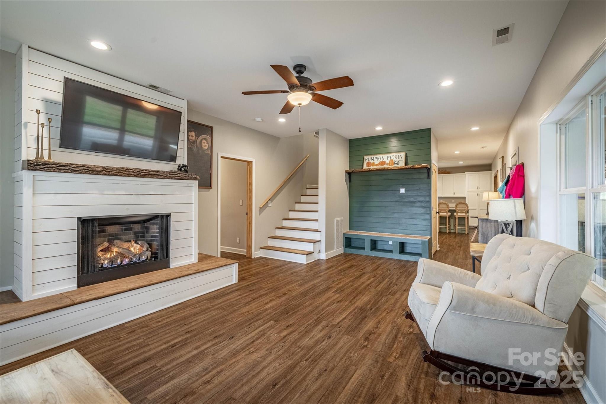 4447 Steeltown Road Lenoir, NC 28645 - Photo 19 of 42 a living room with furniture and a fireplace