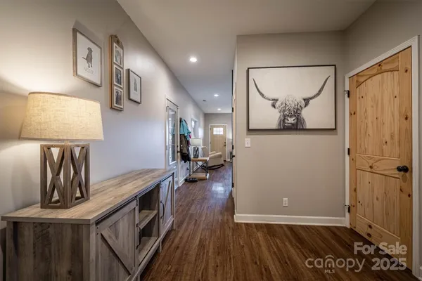 a view of a kitchen with a sink and cabinets