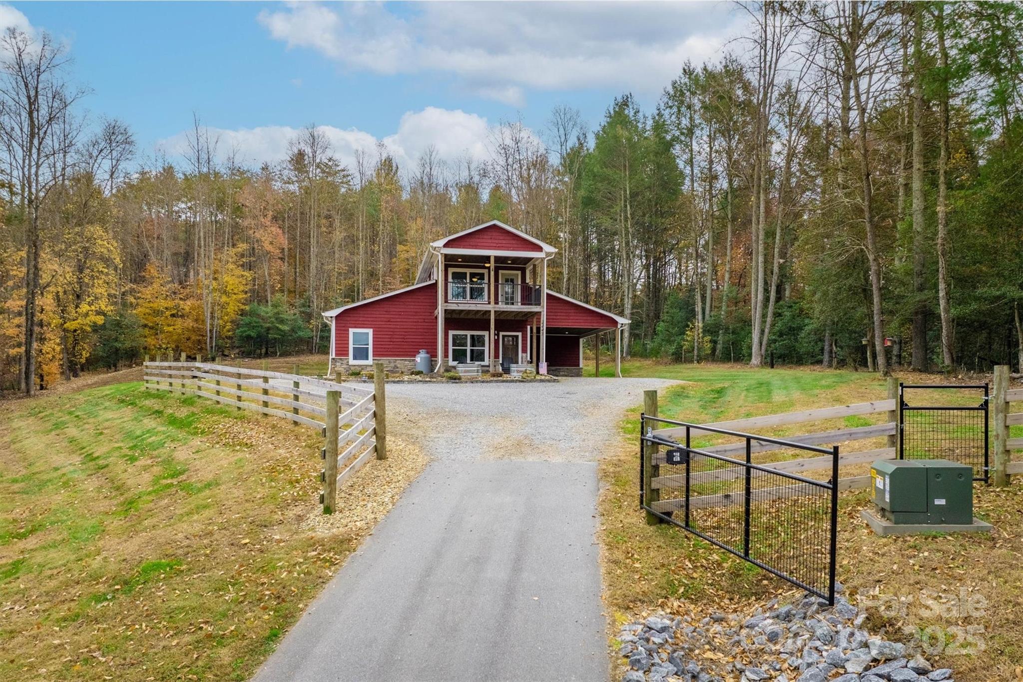 4447 Steeltown Road Lenoir, NC 28645 - Photo 3 of 42 a view of swimming pool with lawn chairs and large trees