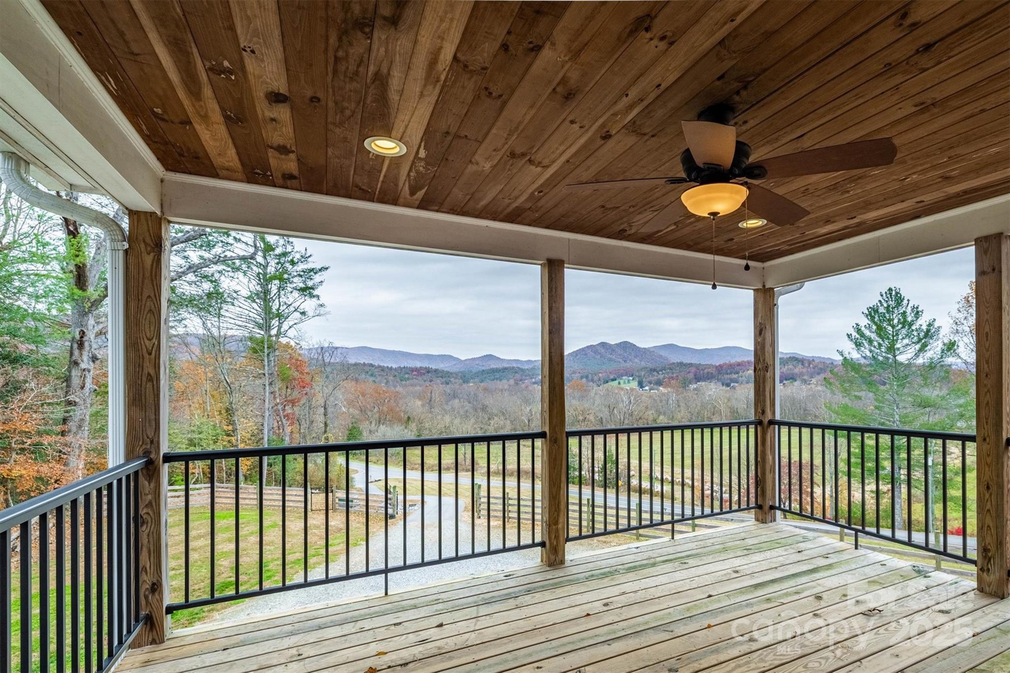 4447 Steeltown Road Lenoir, NC 28645 - Photo 37 of 42 a view of a porch with wooden floor