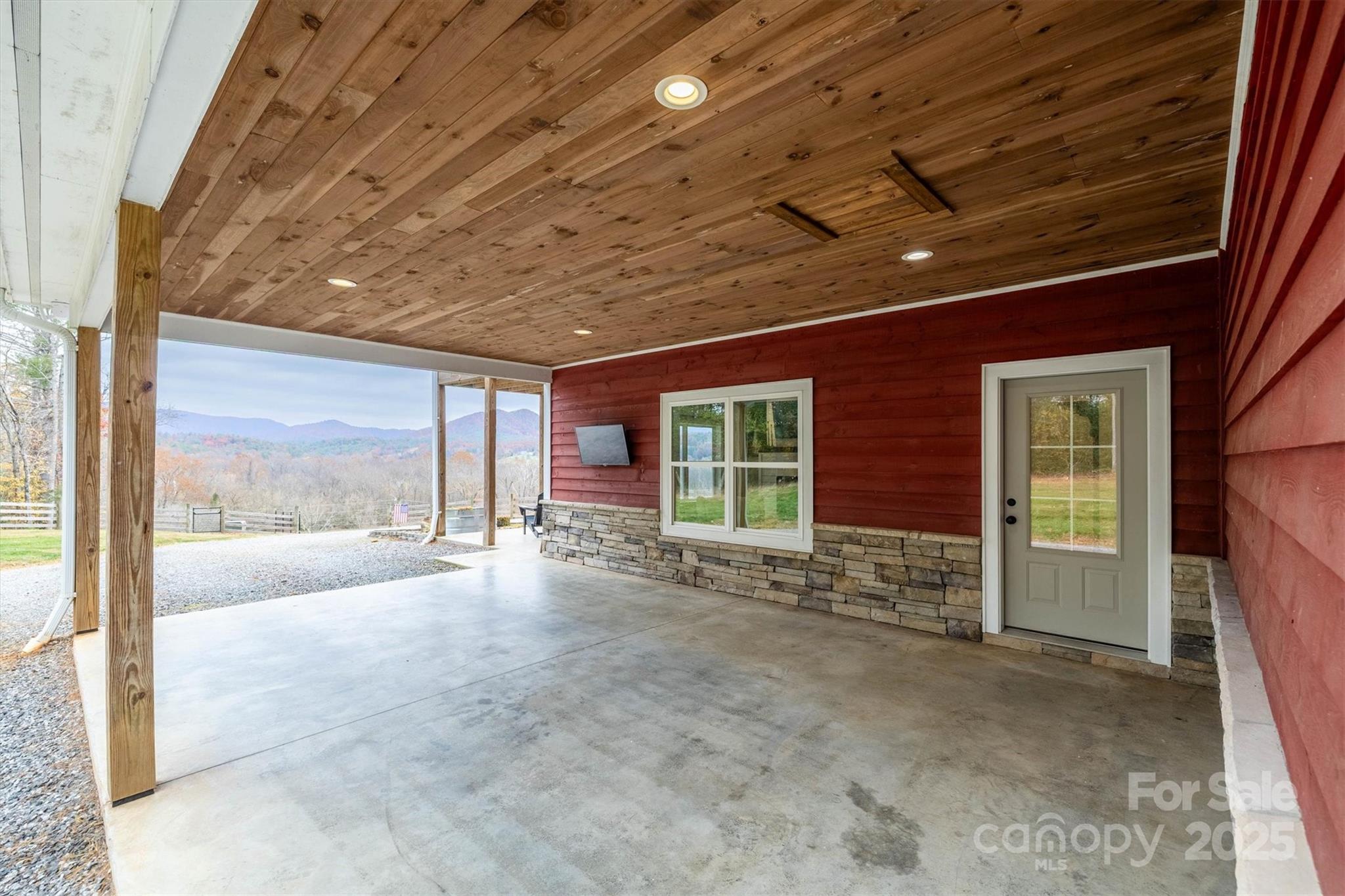 4447 Steeltown Road Lenoir, NC 28645 - Photo 7 of 42 a view of an empty room with a fireplace