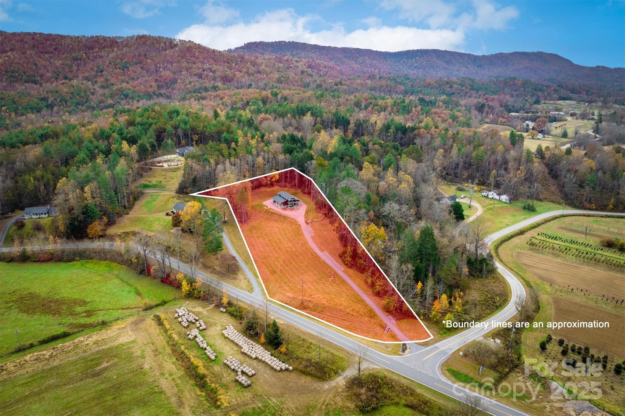 4447 Steeltown Road Lenoir, NC 28645 - Photo 10 of 42 a view of a swimming pool with a mountain