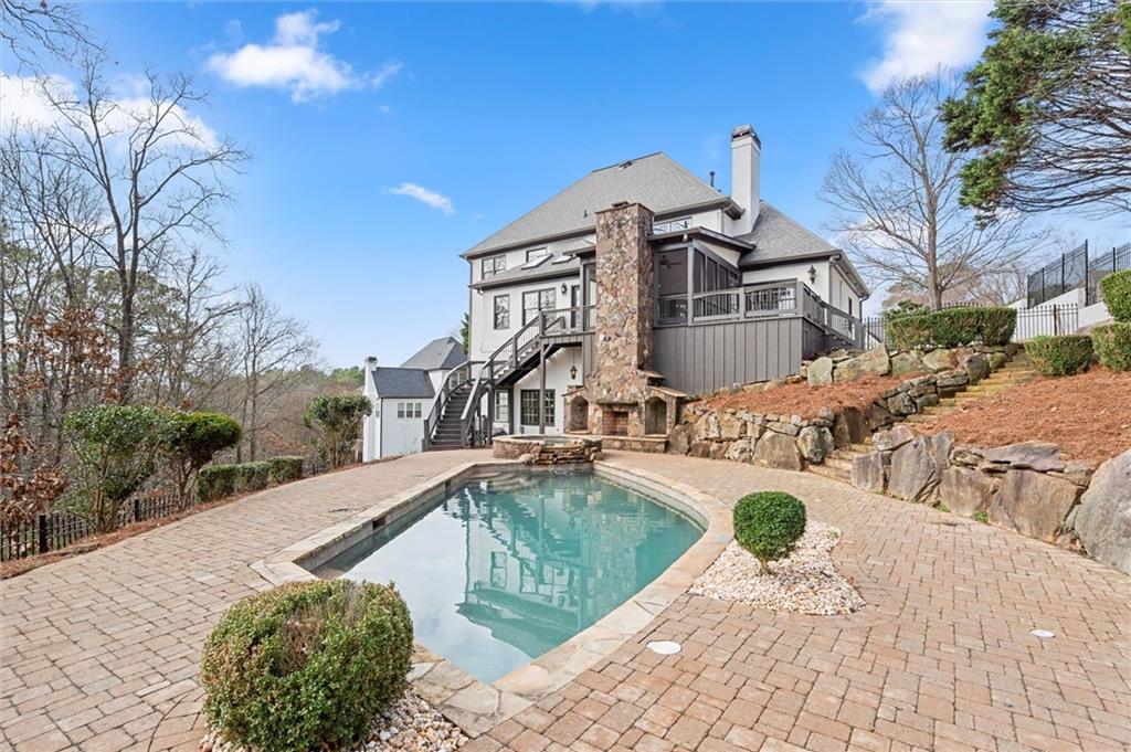 539 Schofield Drive Powder Springs, GA 30127 - Photo 3 of 41 a front view of a house with swimming pool