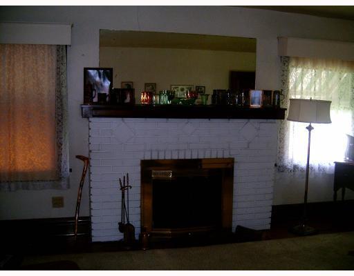 639 Mt Jackson Road New Castle, PA 16102 - Photo 5 of 18 Living Room. Large wood burning fireplace in living room.