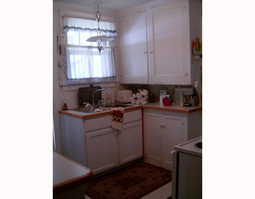 639 Mt Jackson Road New Castle, PA 16102 - Photo 8 of 18 Kitchen. Very tall cabinetry in kitchen.