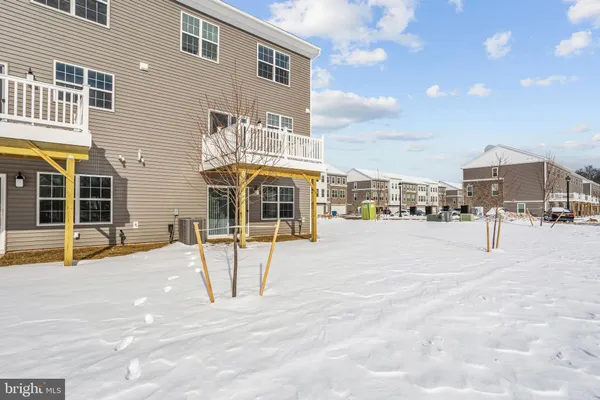 a front view of a building with street view