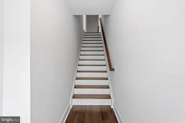 a view of entryway with wooden floor