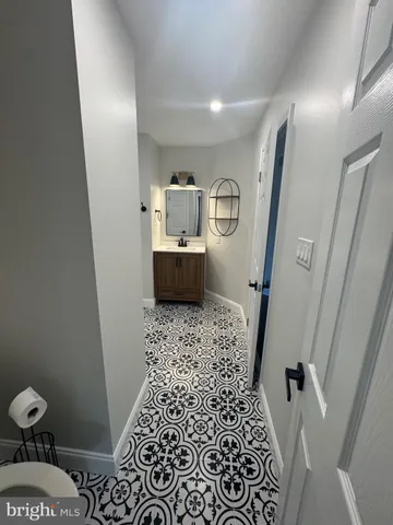 a bathroom with a sink and a toilet