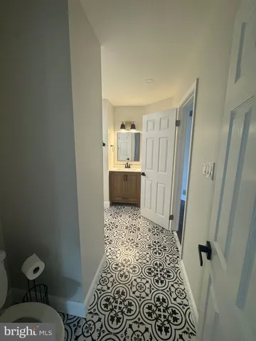 a bathroom with a sink and a shower