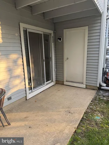 a kitchen with stainless steel appliances a sink stove and cabinets