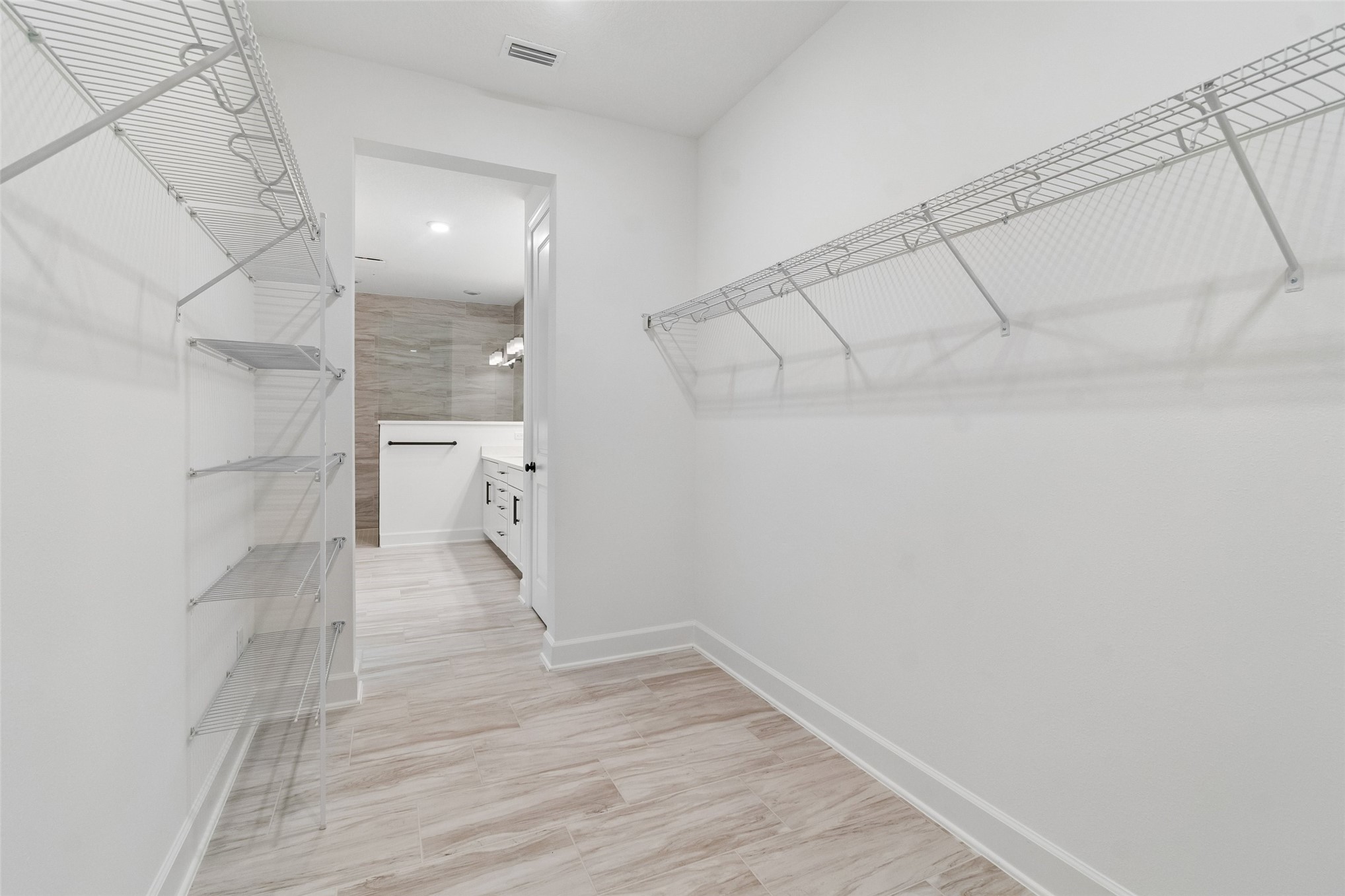 718 Windchime Street Yulee, FL 32097 - Photo 25 of 28 a view of empty room with wooden floor