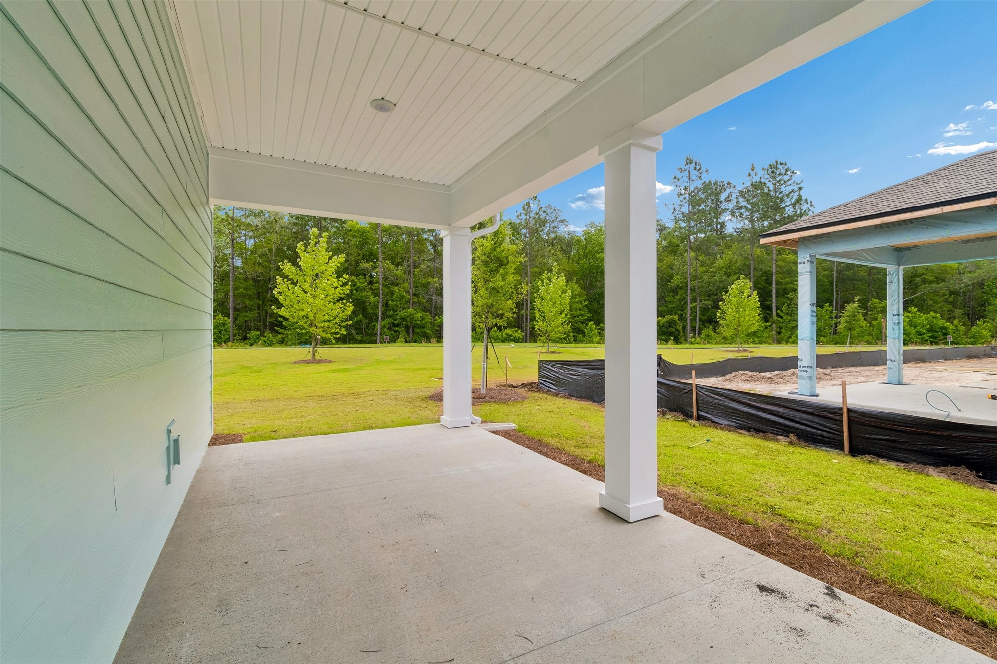 718 Windchime Street Yulee, FL 32097 - Photo 26 of 28 a view of a room with a swimming pool