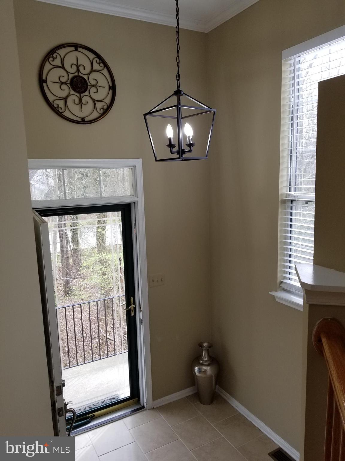 12233 Fletchertown Road Bowie, MD 20720 - Photo 2 of 33 A pleasantly spacious Entry Foyer with new tiles