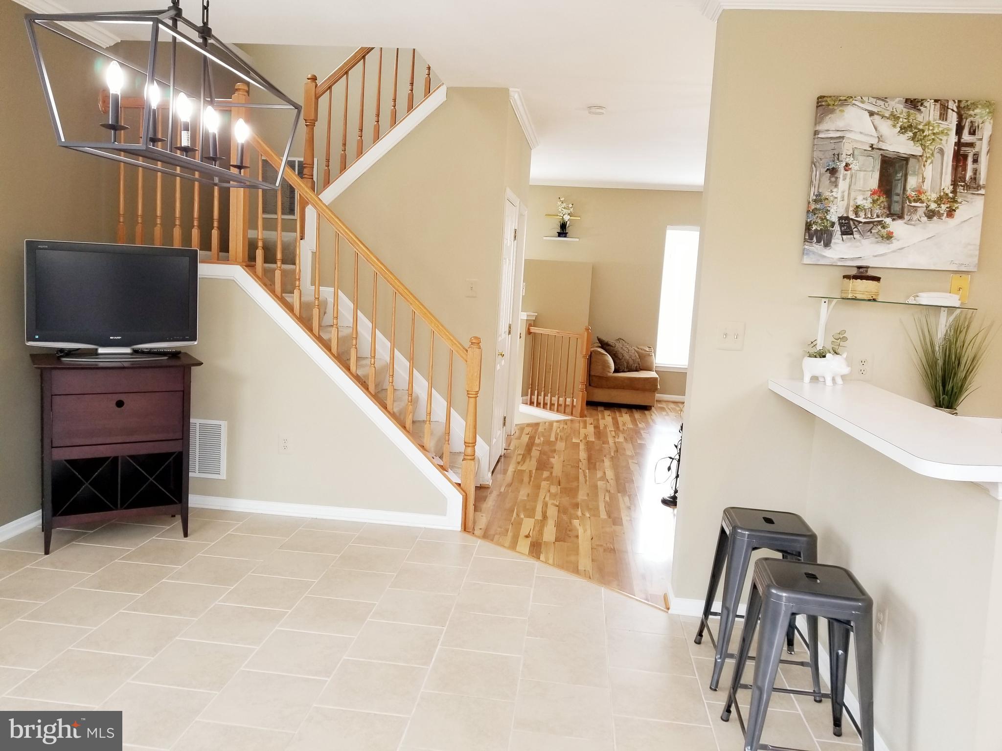 12233 Fletchertown Road Bowie, MD 20720 - Photo 15 of 33 Exit Kitchen & Den towards Upper Level access