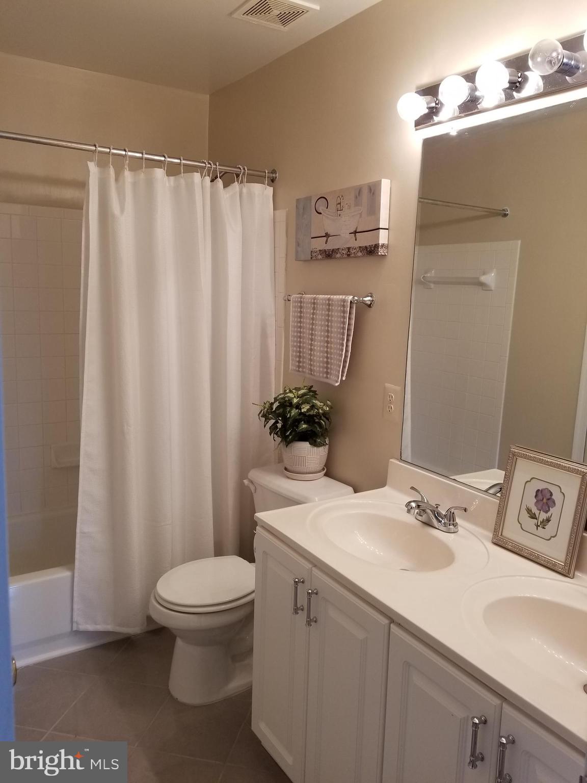 12233 Fletchertown Road Bowie, MD 20720 - Photo 18 of 33 Upper Level Hall Bath with double sink