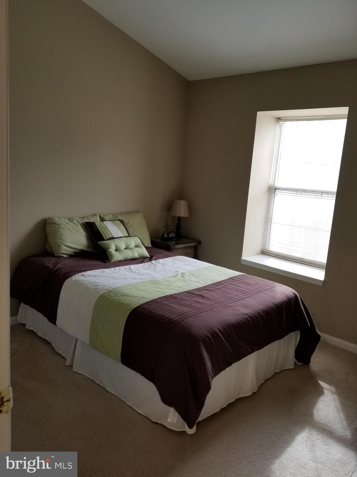 12233 Fletchertown Road Bowie, MD 20720 - Photo 19 of 33 Secondary Bedroom with Cathedral ceilings