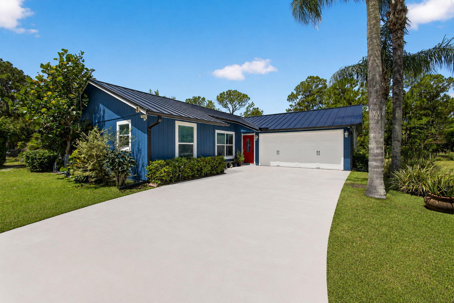 12558 165th Road North Jupiter, FL 33478 - Photo 7 of 67 a view of a house with a yard