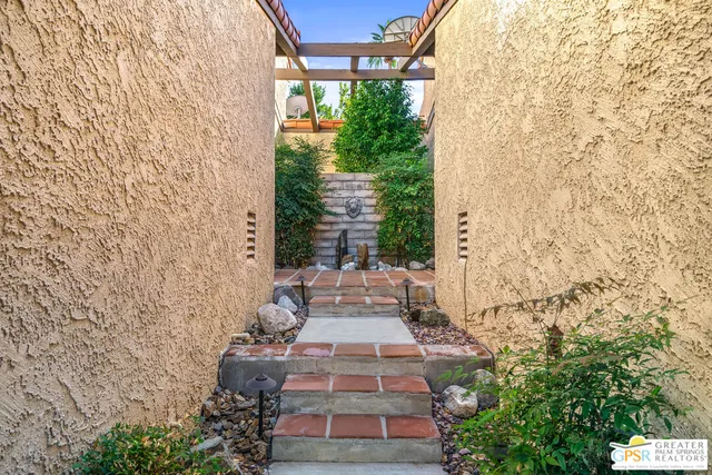 a view of a yard with large trees