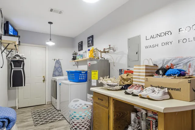 a storage room with washer and dryer
