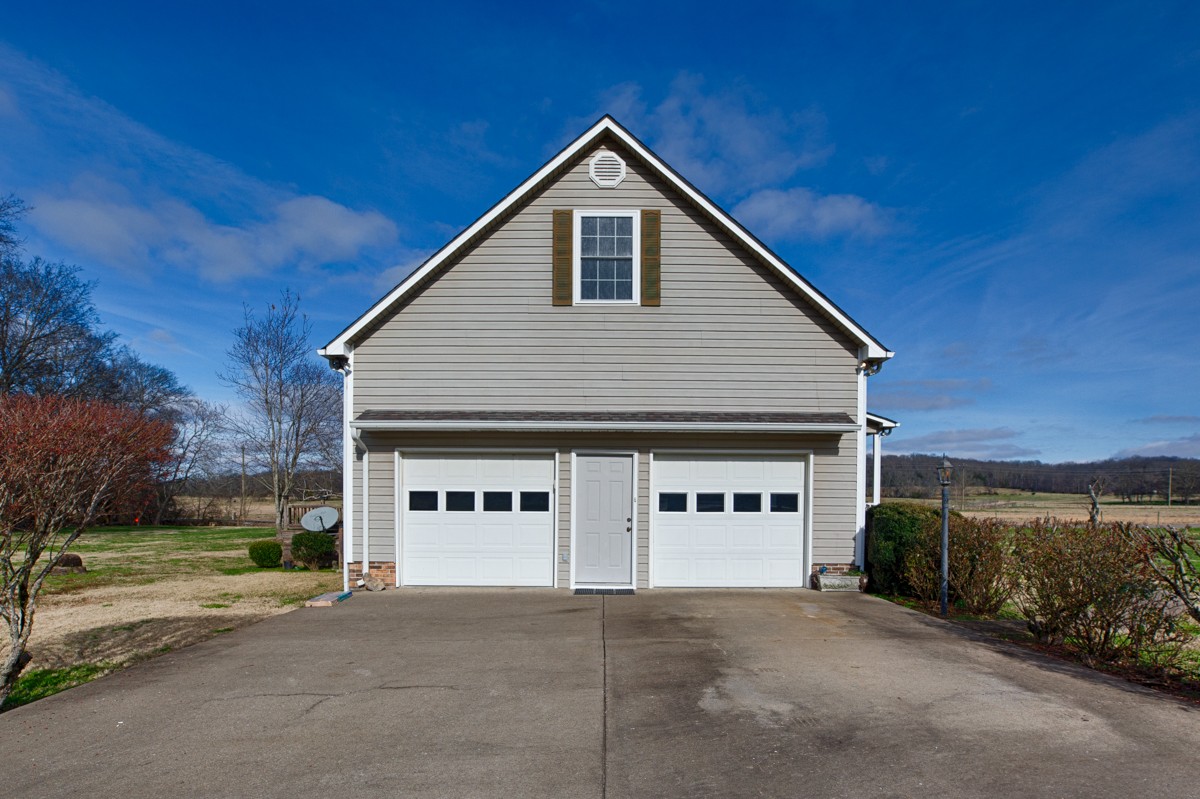 673 Molino Road Fayetteville, TN 37334 - Photo 24 of 31 a view of a house with a yard