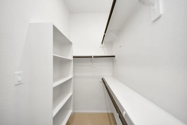 a view of wooden floor in a kitchen