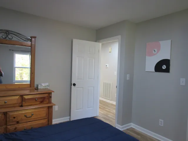 a view of room with hardwood floor