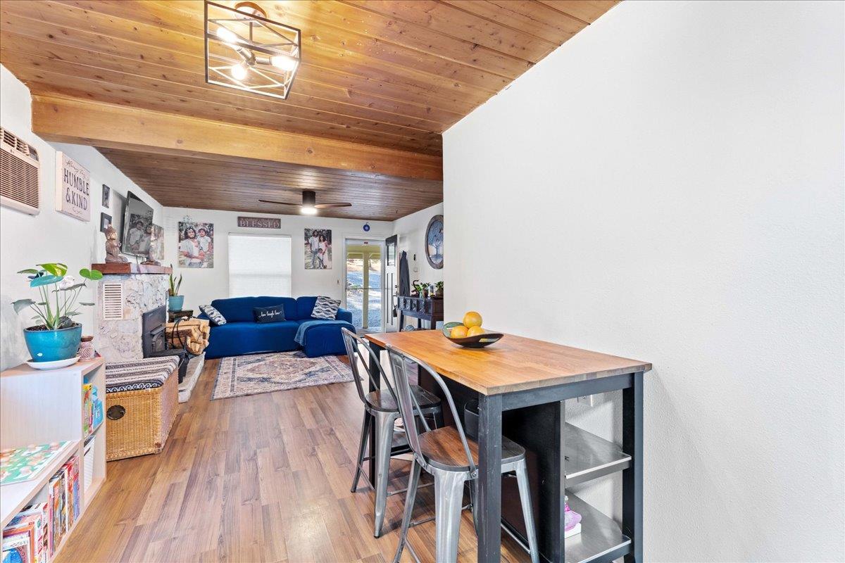 6780 Ridgeway Drive Pollock Pines, CA 95726 - Photo 10 of 27 a view of a dining room with furniture and a kitchen