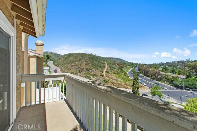 a view of a city from a balcony