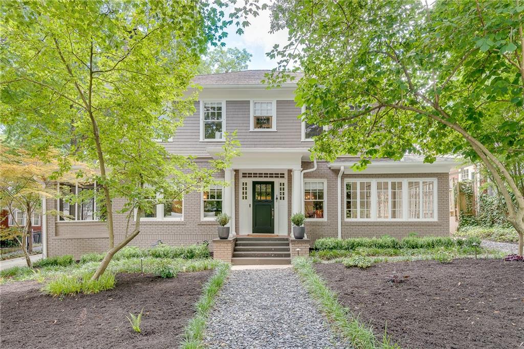 1287 Oxford Road Northeast Atlanta, GA 30306 - Photo 1 of 1 front view of a house with a yard