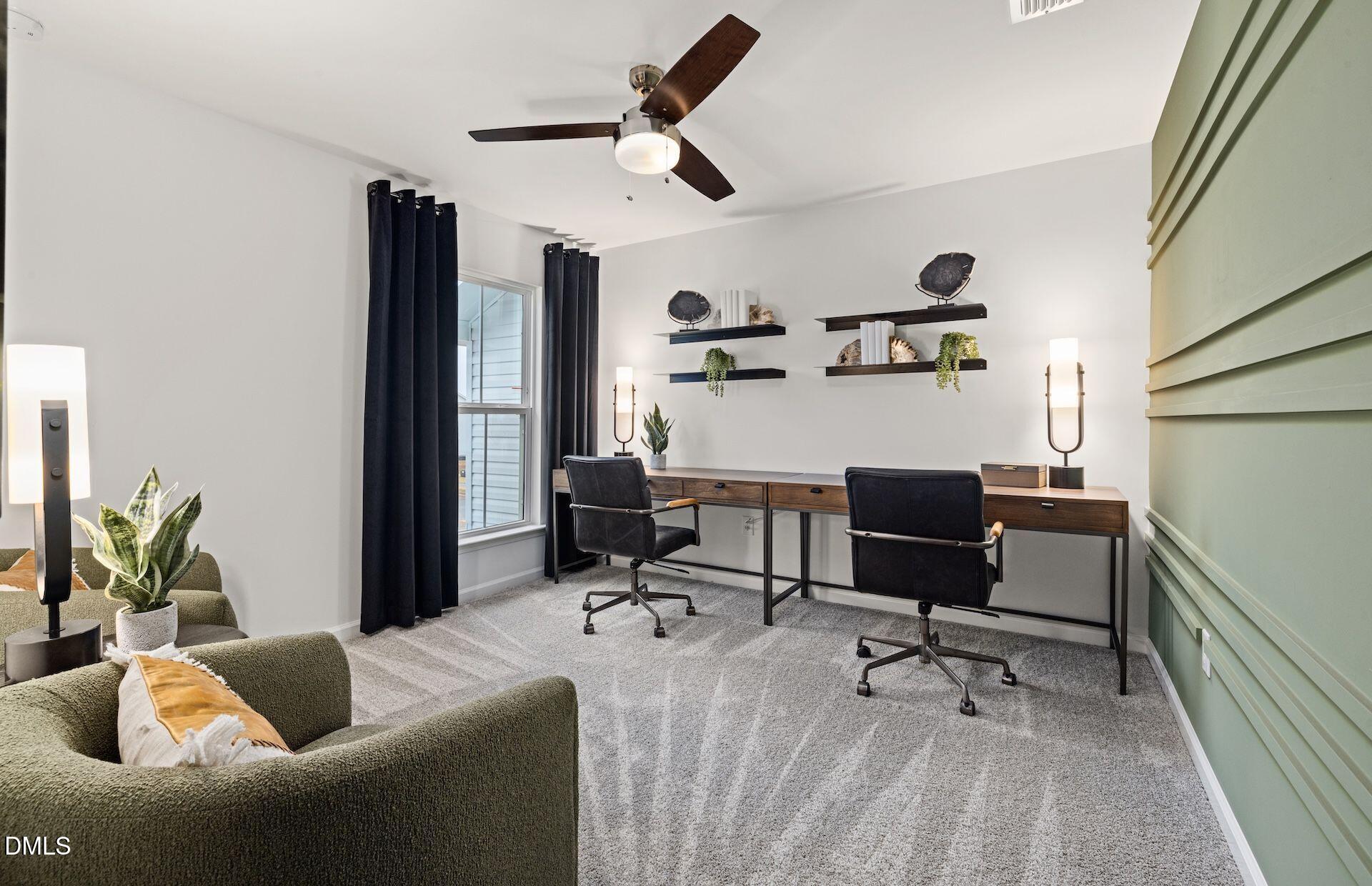 5021 Reader Way Durham, NC 27703 - Photo 17 of 32 a work room with furniture and a rug