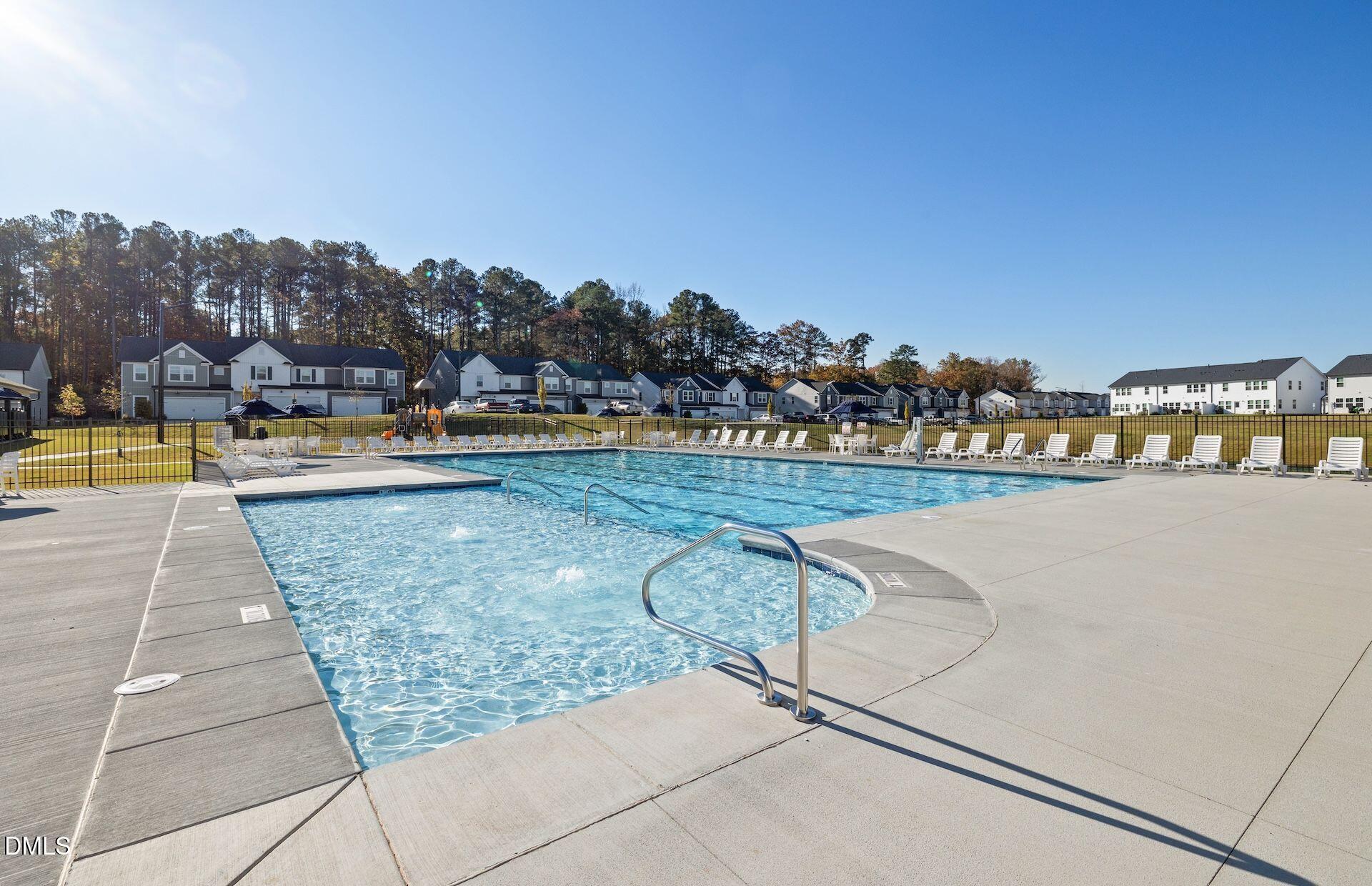 5021 Reader Way Durham, NC 27703 - Photo 23 of 32 a view of swimming pool with outdoor seating and city view