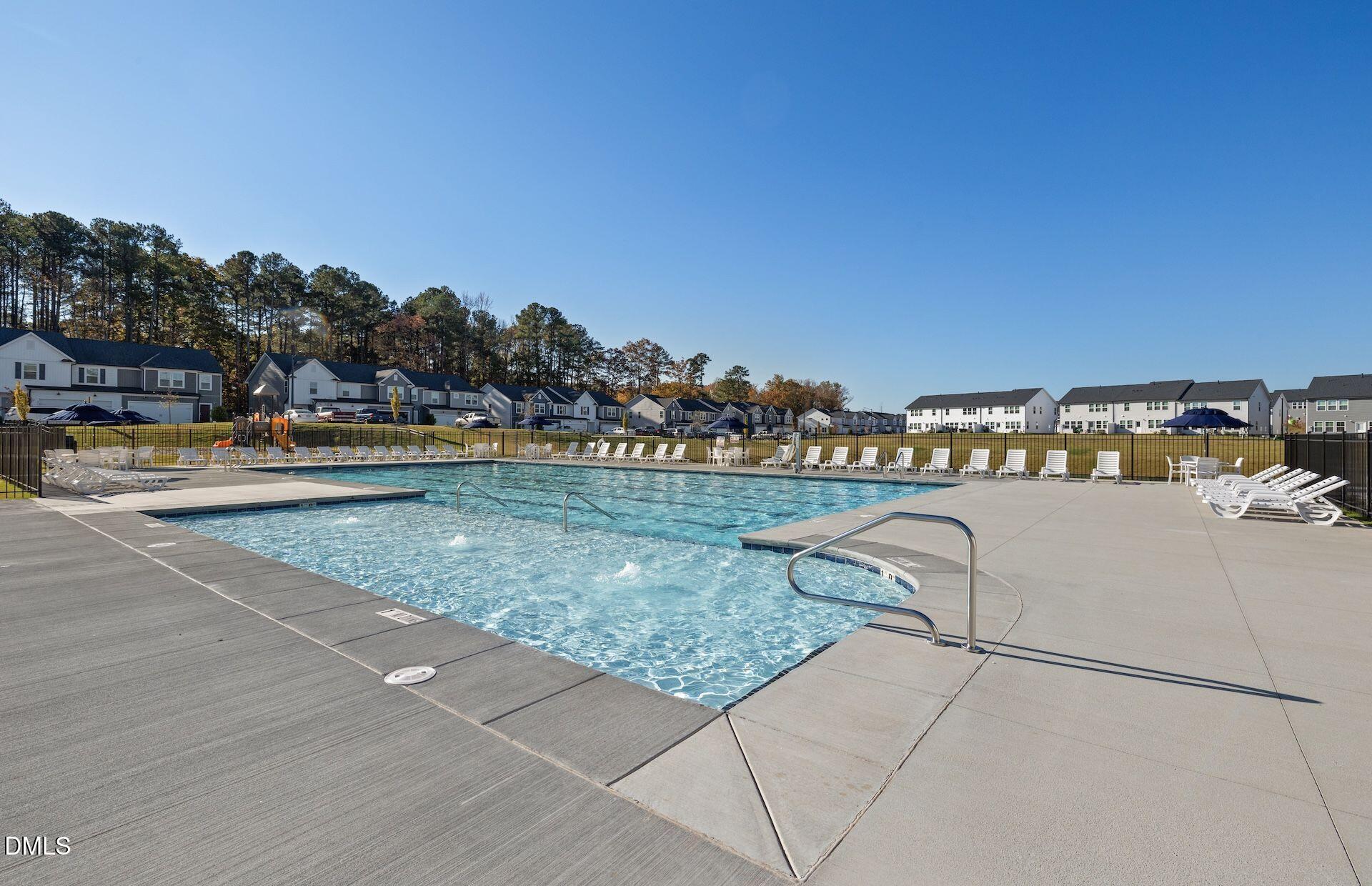 5021 Reader Way Durham, NC 27703 - Photo 28 of 32 a view of swimming pool with outdoor seating and city view