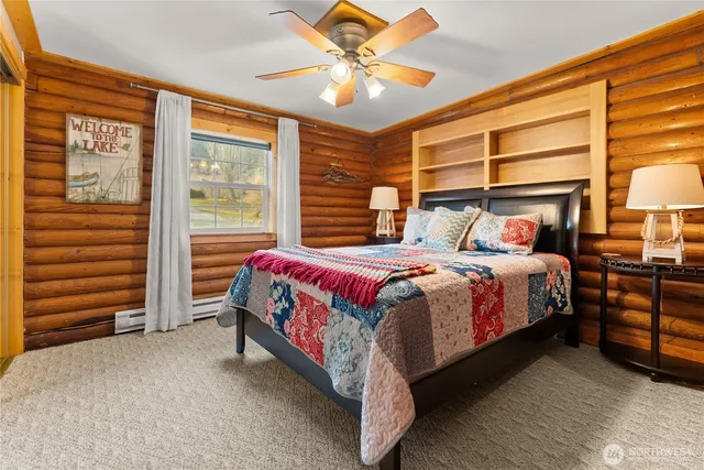 a bedroom with a bed and a walk in closet