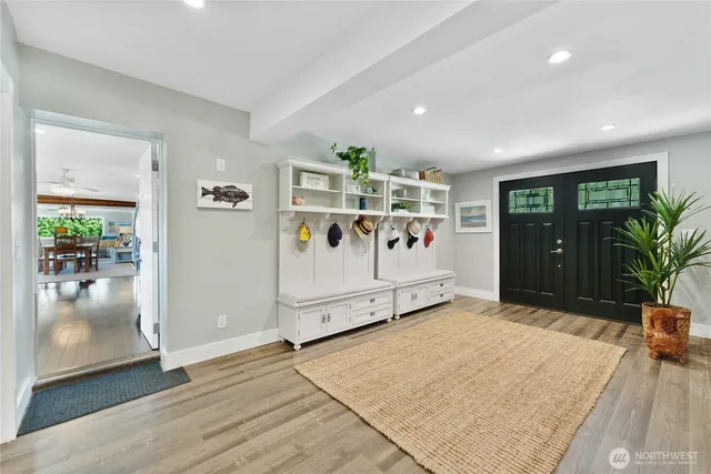 a view of a livingroom with furniture and window