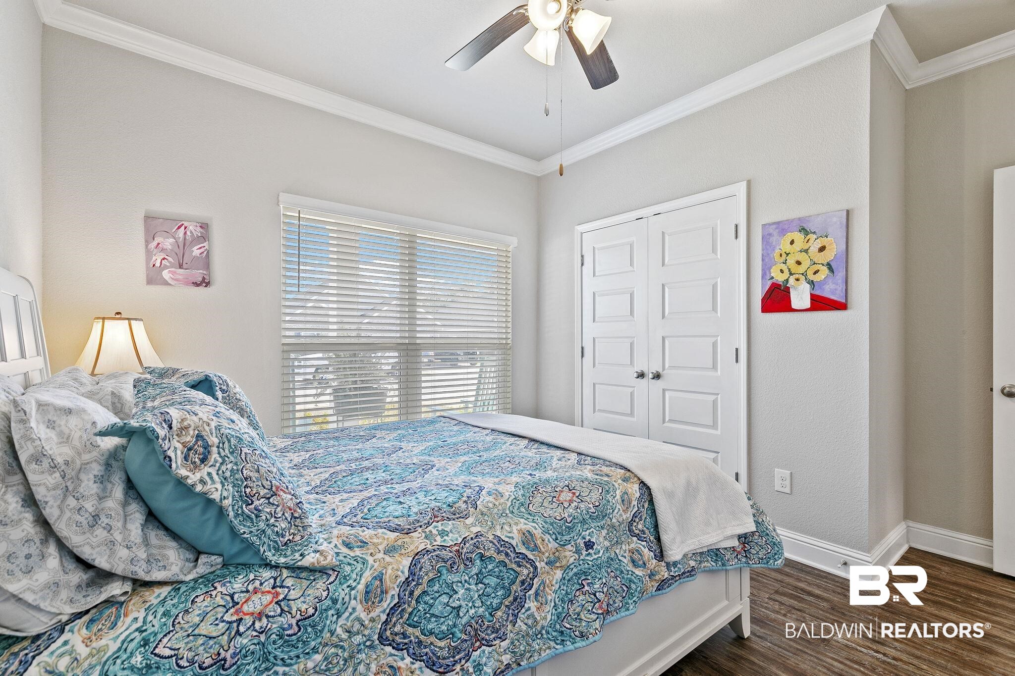 1319 Kairos Loop Foley, AL 36535 - Photo 37 of 64 Bedroom featuring dark hardwood / wood-style flooring, ceiling fan, a closet, and ornamental molding