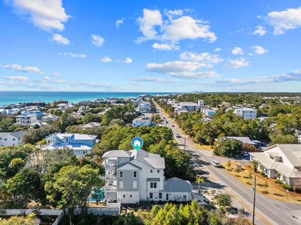 a view of city with ocean