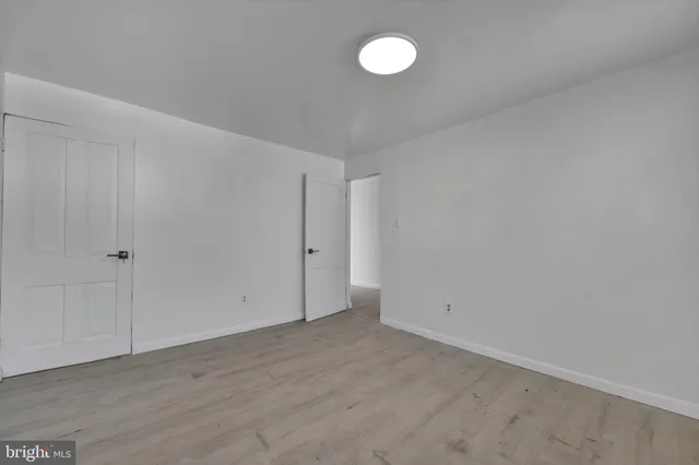 a view of a room that has a small window