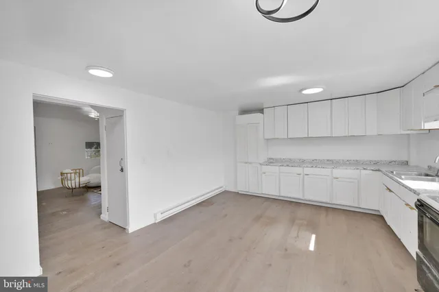 an empty room with a empty space and window