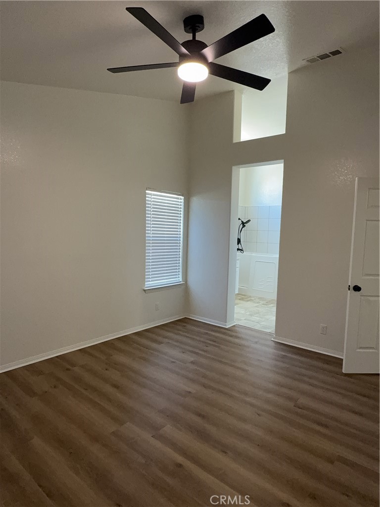 12590 Cobalt Road Victorville, CA 92392 - Photo 27 of 37 wooden floor in an empty room