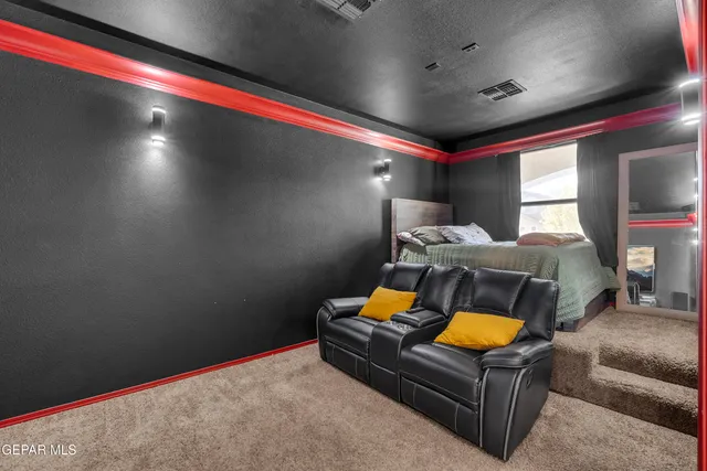 a kitchen with stainless steel appliances a stove a sink and a microwave