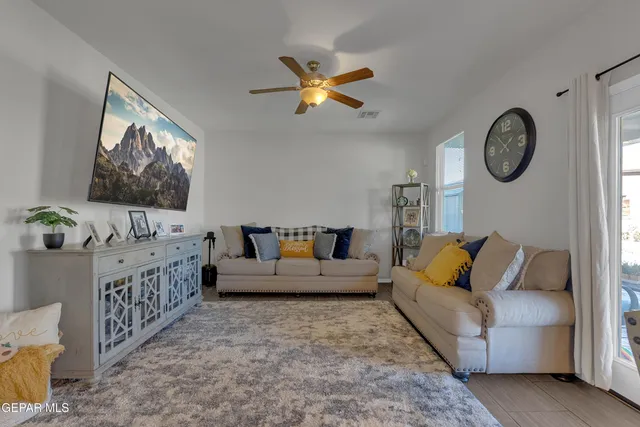 a bathroom with a granite countertop sink mirror and bathtub
